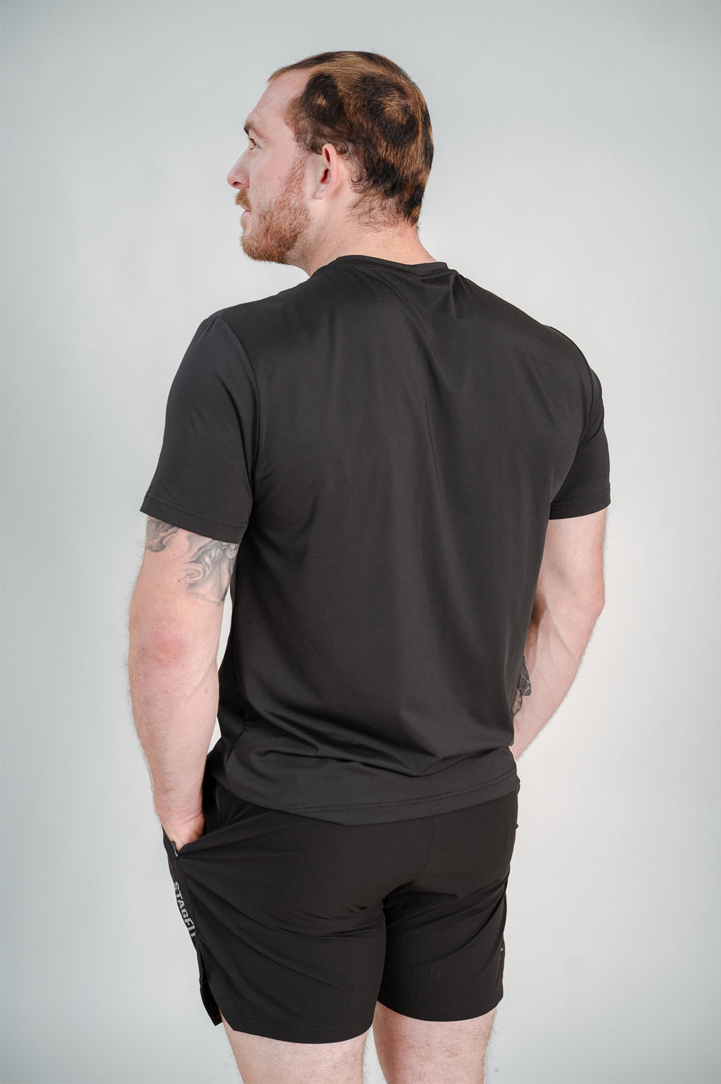 StagFit Performance T-shirt black — back view on model.