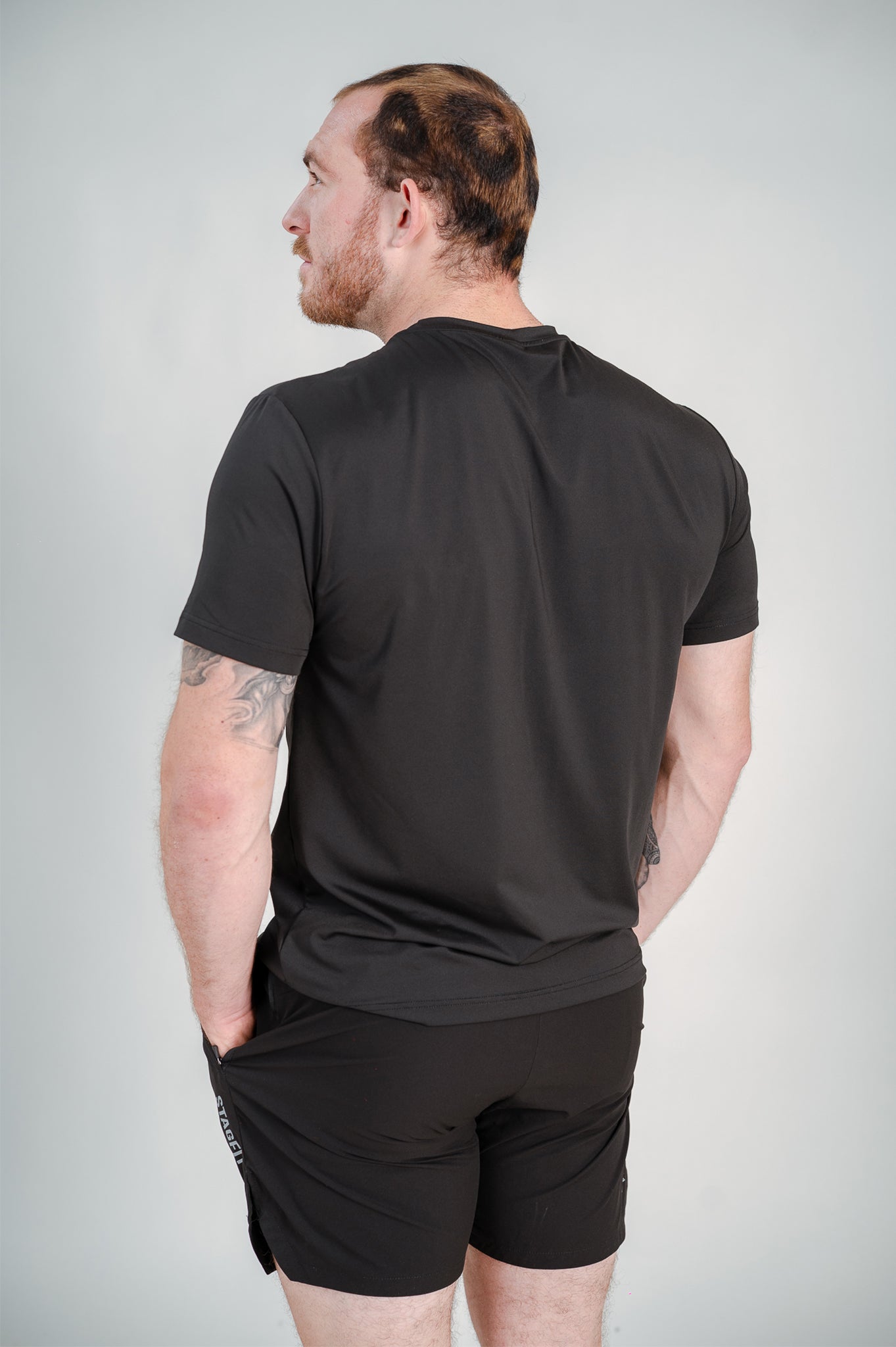 StagFit Performance T-shirt black — back view on model.