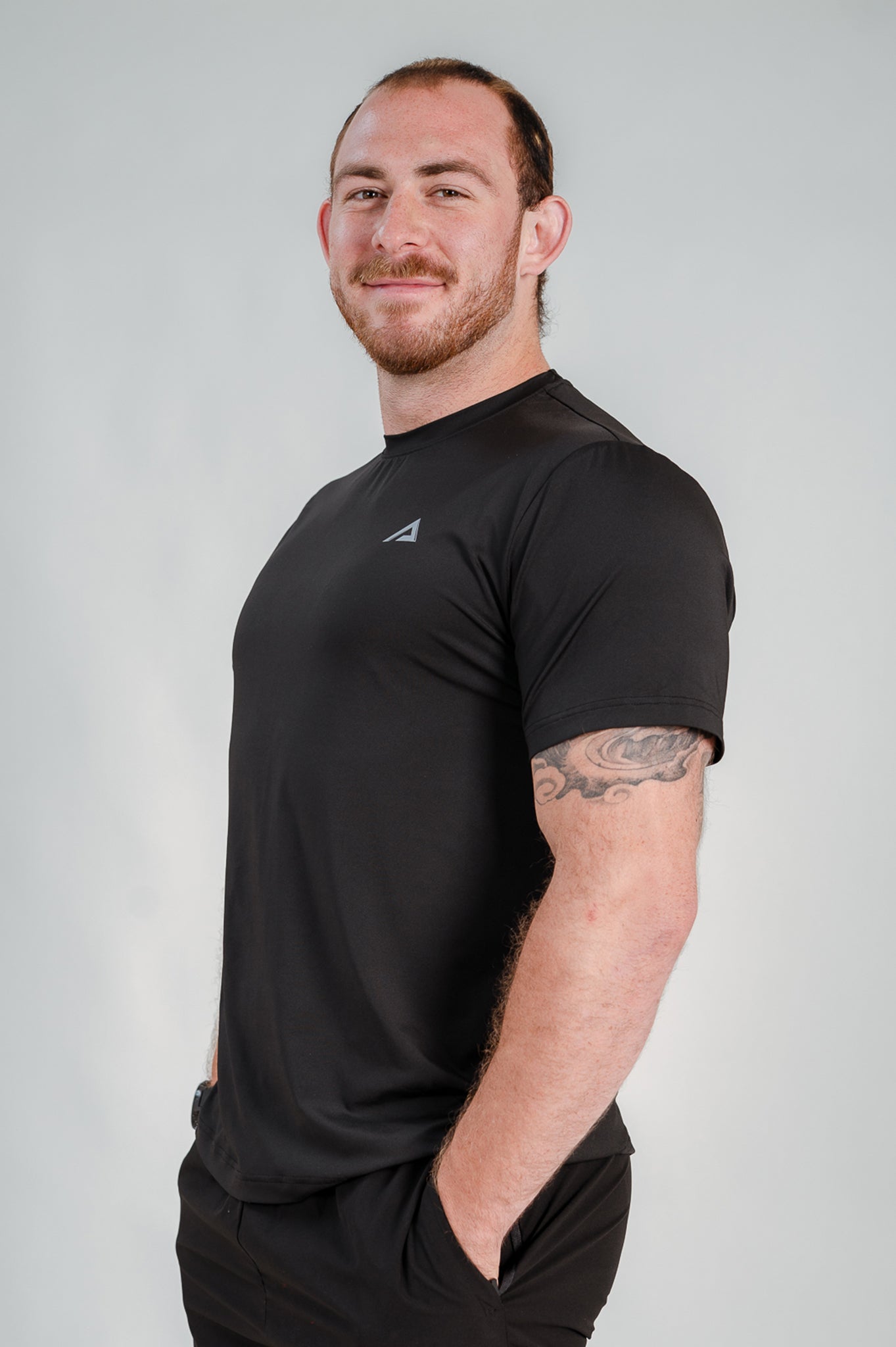 StagFit Performance T-shirt black — side view on model.